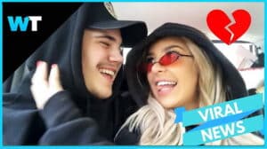 Young couple in hoodies smiling at each other with a broken heart icon and "Viral News" text overlay