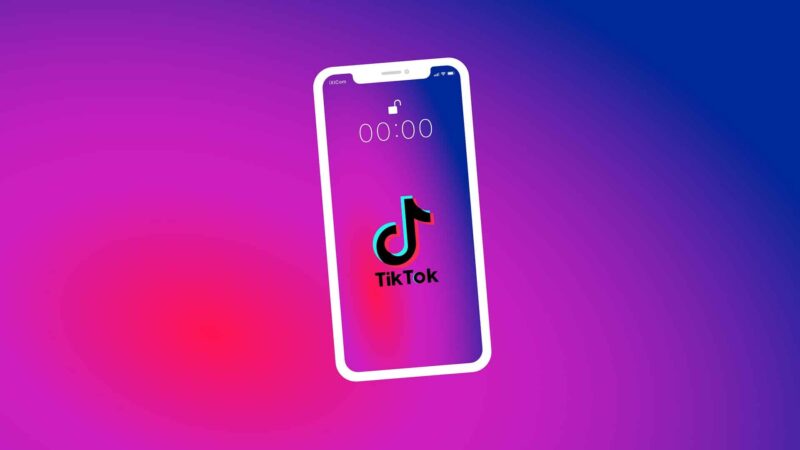 Smartphone displaying the TikTok logo on a purple and blue gradient background.