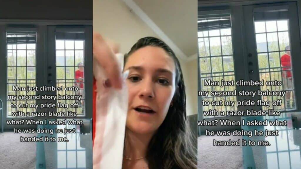Woman holding a pride flag with text about a man climbing her second-story balcony to cut it with a razor blade.