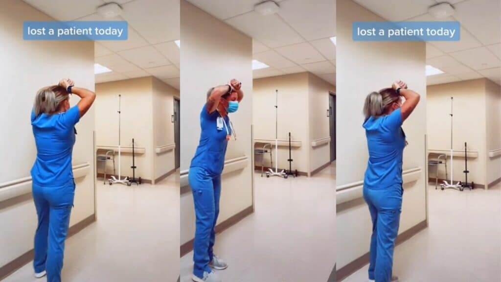 Nurse in blue scrubs and mask expressing distress in hospital hallway with text "lost a patient today"