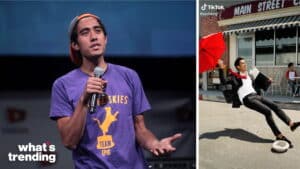 Man in purple "Huskies Team Epic" shirt speaking into microphone; man in suit falling backward holding red umbrella on street.