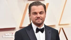 Leonardo DiCaprio wearing a black tuxedo and bow tie at a formal event.