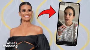 Lea Michele smiling in a black dress next to a phone showing her TikTok video calling Jonathan to read comments.