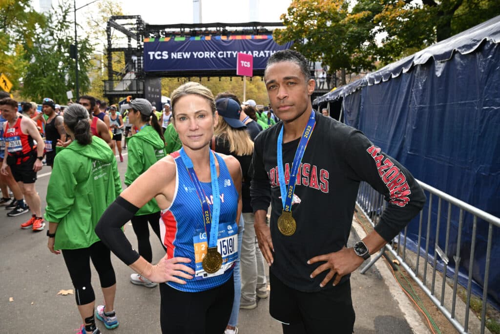 Amy Robach and TJ Holmes run during the 2022 TCS New York City Marathon on November 06, 2022 in New York City.