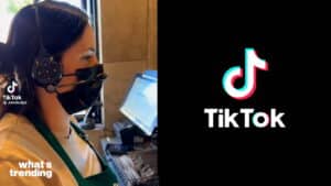 Woman wearing a headset and mask working at a computer in a service setting with TikTok logo on screen.