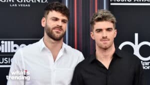 Two men posing at the Billboard Music Awards with MGM Grand Las Vegas and ABC logos in the background