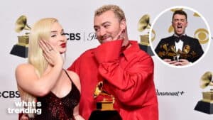 Singers Dua Lipa and Sam Smith posing with Grammy Awards at the CBS and Paramount+ event