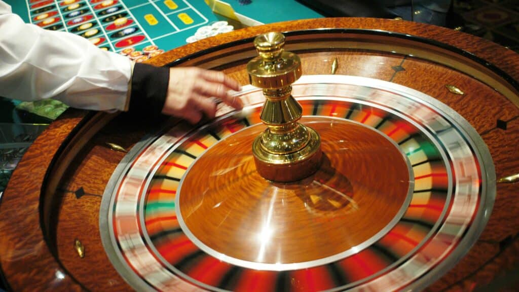 ATLANTIC CITY, NJ - JULY 8: The roulette wheel spins at Caesars Atlantic City July 8, 2006 in Atlantic City, New Jersey. Caesars, along with Atlantic City's 11 other casinos reopend this morning after they were forced to close their gambling floors for the first time in their 28-year history due to the New Jersey state budget impasse.