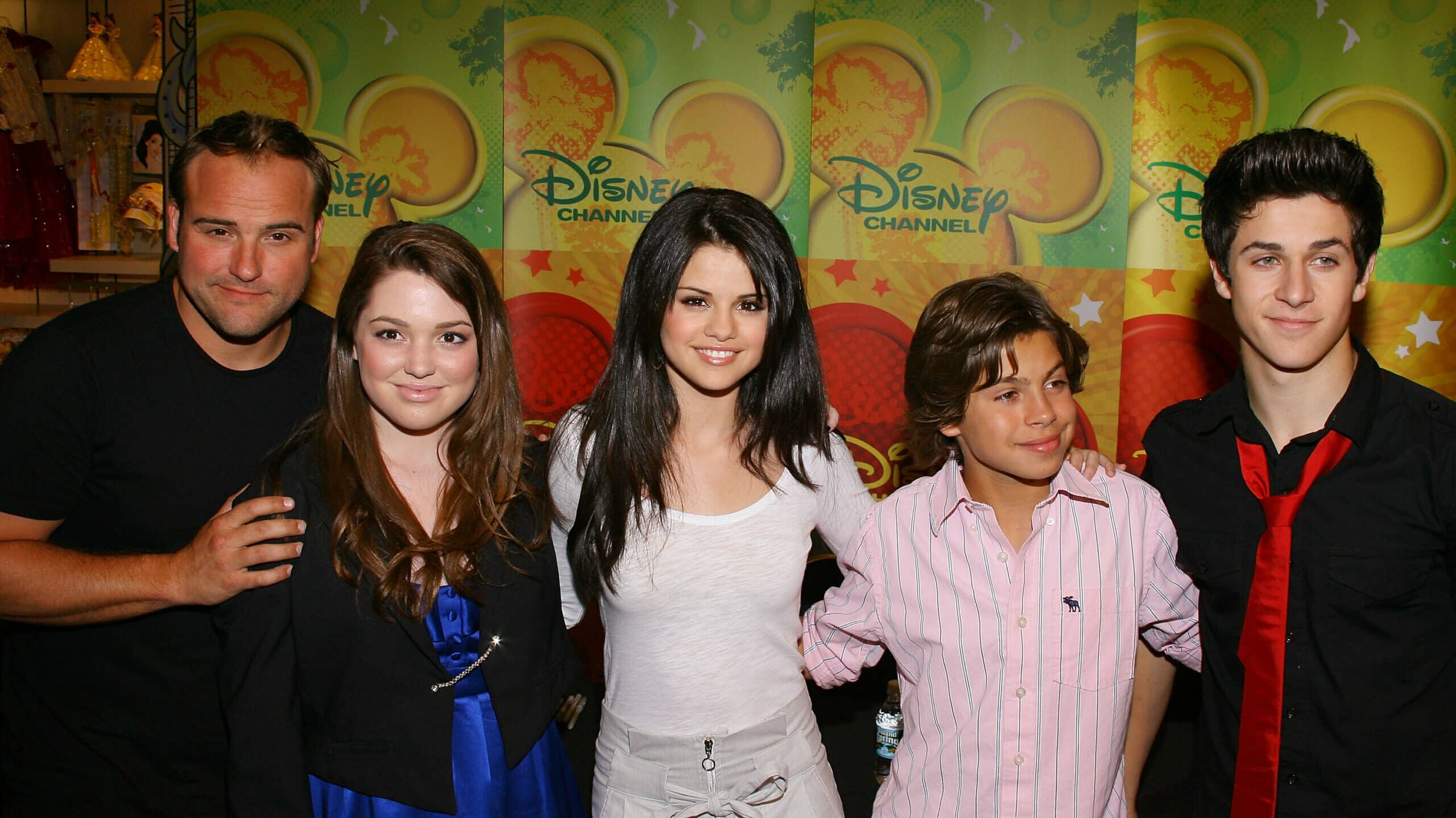 Actors David DeLuise, Jennifer Stone, Selena Gomez, Jake T. Austin and David Henrie cast of "Wizards of Waverly Place" visits the World of Disney on September 6, 2008 in New York City.