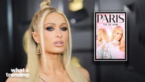 Paris Hilton with the cover of her book "Paris: The Memoir" in the background