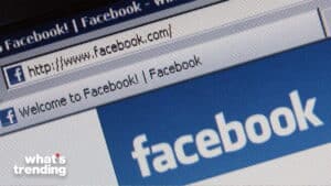 Close-up of a computer screen displaying the Facebook homepage and URL in a web browser.