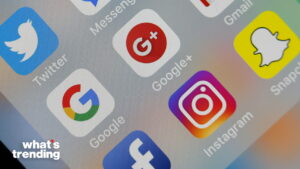 Close-up of smartphone screen showing social media app icons including Twitter, Google, Google+, Instagram, Facebook, Snapchat, and Messenger