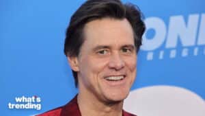 Jim Carrey smiling against a blue background with "what's trending" text in the corner
