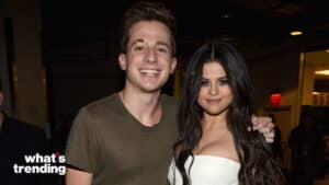 Charlie Puth and Selena Gomez posing together at an event
