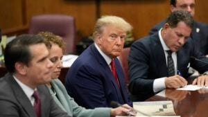 Former U.S. President Donald Trump sits at the defense table with his defense team in a Manhattan court during his arraignment on April 4, 2023, in New York City. Trump was arraigned during his first court appearance today following an indictment by a grand jury that heard evidence about money paid to adult film star Stormy Daniels before the 2016 presidential election. With the indictment, Trump becomes the first former U.S. president in history to be charged with a criminal offense.
