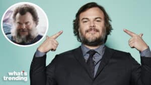Jack Black in a suit pointing at an inset image of his character with a large beard and wild hair