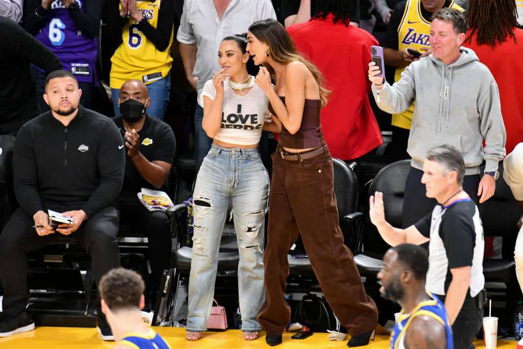 Kim Kardashian (L) and Sarah Staudinger attend a playoff basketball game between the Los Angeles Lakers and the Golden State Warriors at Crypto.com Arena on May 08, 2023 in Los Angeles, California.