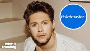 Close-up of a young man with blue eyes and brown hair next to the Ticketmaster logo and "what's trending" text.