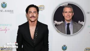 Tommy Dorfman in a black suit with a mustache at a red carpet event, inset of Andy Cohen in a gray suit and tie