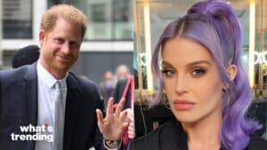 Prince Harry waving in a suit and a woman with purple hair styled in a high ponytail and hoop earrings