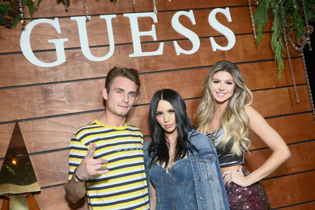 James Kennedy, Scheana Shay and Raquel Leviss, wearing GUESS, attend the GUESS Holiday 2018 Event on November 7, 2018 in West Hollywood, California.