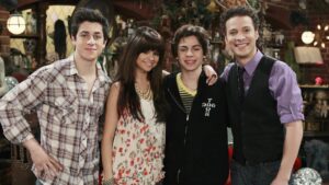 WIZARDS OF WAVERLY PLACE - "Wizard of the Year" - After Alex is awarded Wizard of the Year, her former crush Chase stops by and congratulates her with the paparazzi in tow. The encounter quickly turns into a gossip item and marks the two as dating. Upset by the rumor, Alex's current boyfriend Mason decides to confront Chase at Alex's award banquet, in a new episode of "Wizards of Waverly Place," premiering FRIDAY, JULY 8 (8:05-8:35 p.m., ET/PT) on Disney Channel.