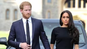 Harry, Duke of Sussex, and Meghan, Duchess of Sussex arrive on the long Walk at Windsor Castle arrive to view flowers and tributes to HM Queen Elizabeth on September 10, 2022 in Windsor, England. Crowds have gathered and tributes left at the gates of Windsor Castle to Queen Elizabeth II, who died at Balmoral Castle on 8 September, 2022.