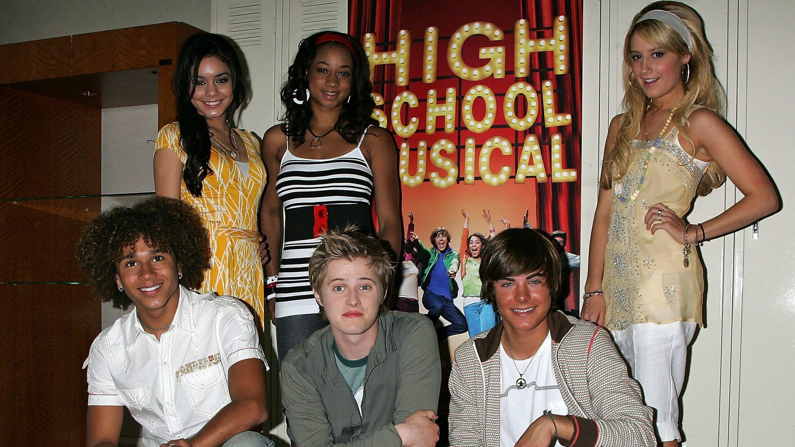 HOLLYWOOD - MAY 04: (L-R, standing) Actresses Vanessa Anne Hudgens, Monique Coleman and Ashley Tisdale, (L-R, kneeling) and actors Corbin Bleu, Lucas Grabeel and Zac Efron attend a Q&A session with the cast and producers of the Disney Channel and Walt Disney Home Entertainment's "High School Musical" at the Renaissance Hollywood Hotel on May 4, 2006 in Hollywood, California.