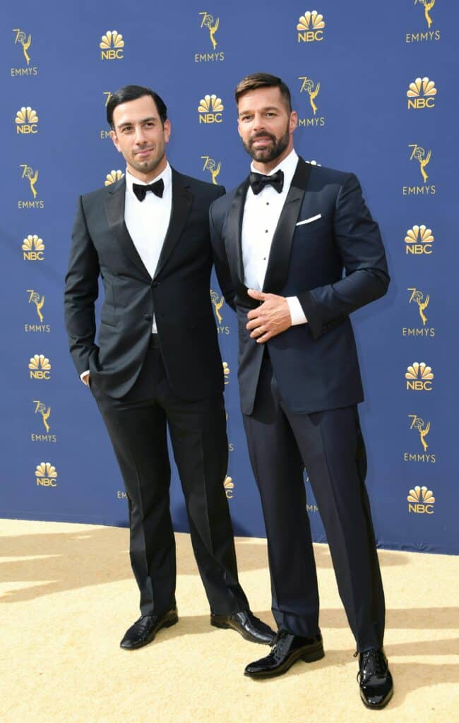 Supporting actor in a limited series or movie nominee Ricky Martin (R) and his husband artist Jwan Yosef (L) arrive for the 70th Emmy Awards at the Microsoft Theatre in Los Angeles, California on September 17, 2018.