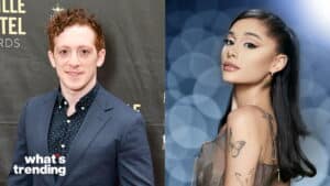 Actor Ben Platt in a suit and singer Ariana Grande with butterfly tattoos and winged eyeliner