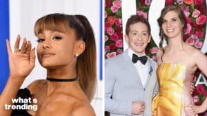Ariana Grande waving and a man in a gray tuxedo with a woman in a yellow strapless dress posing at an event with a floral backdrop