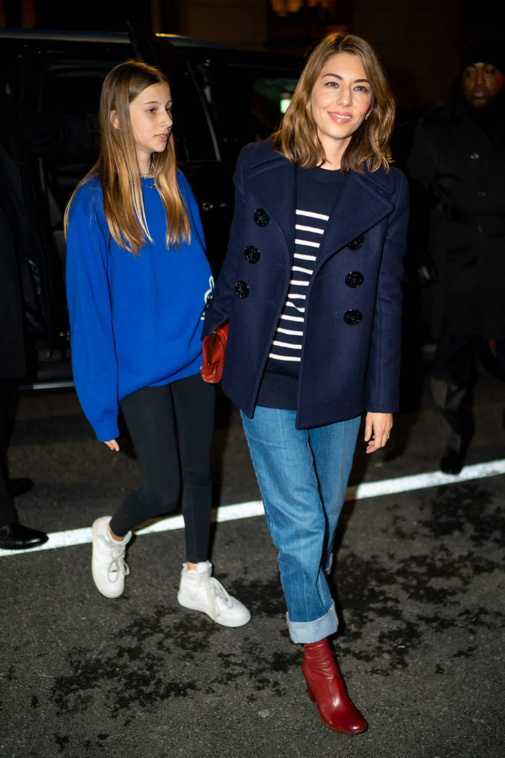 NEW YORK, NEW YORK - FEBRUARY 12: Romy Mars (L) and Sofia Coppola arrives at the Marc Jacobs fashion show at the Park Avenue Armory on February 12, 2020 in New York City.
