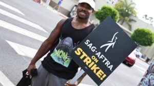 Page Kennedy walks the picket line on Day 5 in support of the SAG-AFTRA and WGA strike at Paramount Pictures Studio on July 17, 2023 in Los Angeles, California.