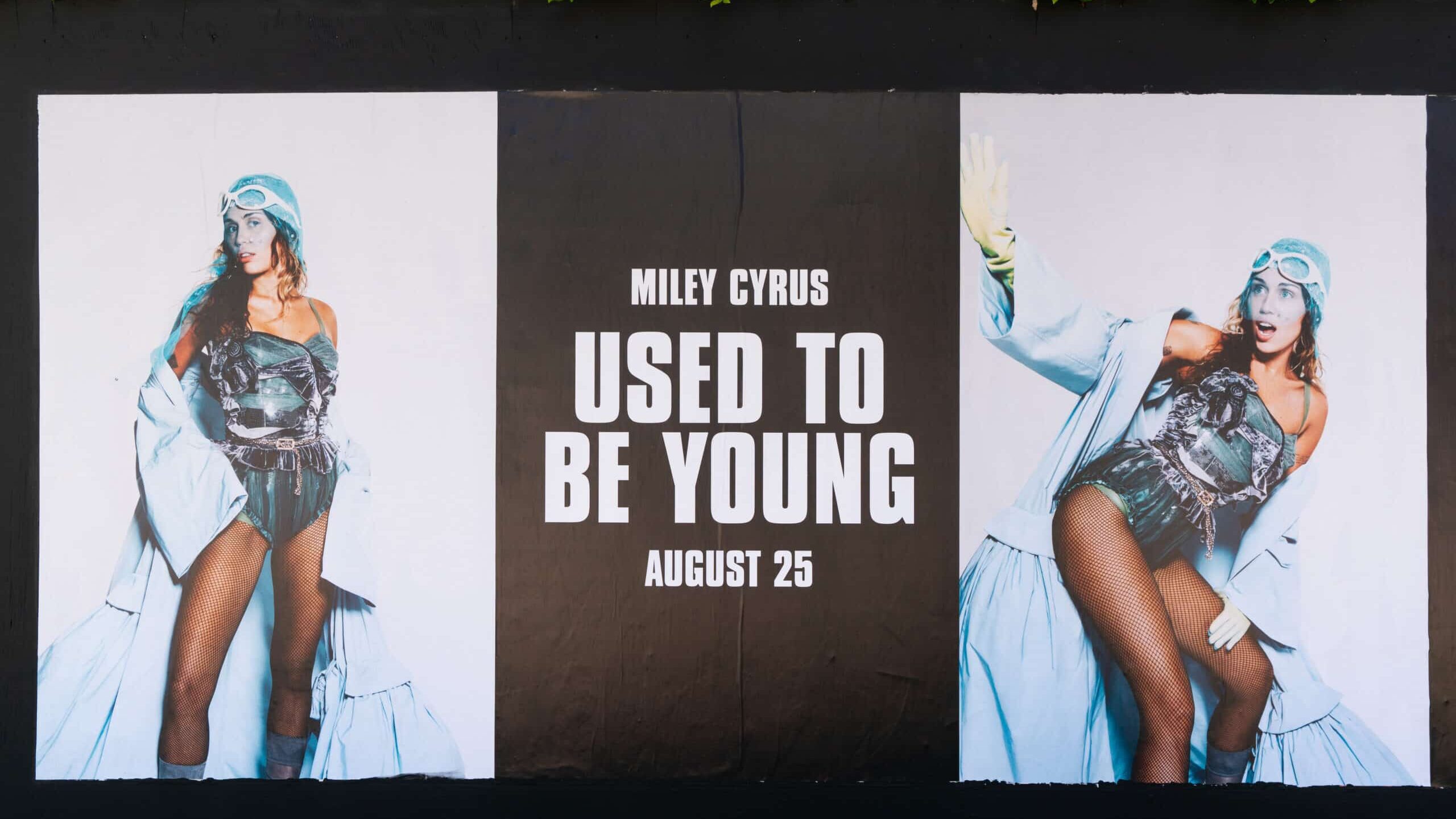 WEST HOLLYWOOD, CA - AUGUST 25: A general view of the Miley Cyrus poster campaign along the Sunset Strip promoting her new single "Used to Be Young" on August 25, 2023 in West Hollywood, California.