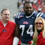 Michael Oher #74 of the Ole Miss Rebels stands with his family during senior ceremonies prior to a game against the Mississippi State Bulldogs at Vaught-Hemingway Stadium on November 28, 2008 in Oxford, Mississippi.