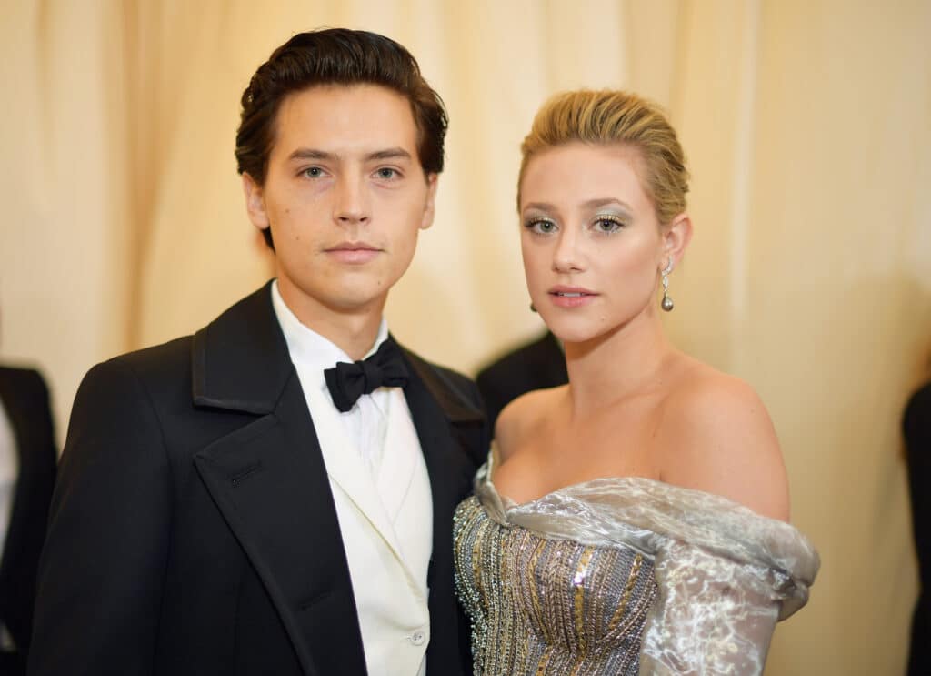 Cole Sprouse and Lili Reinhart attend the Heavenly Bodies: Fashion & The Catholic Imagination Costume Institute Gala at The Metropolitan Museum of Art on May 7, 2018 in New York City.