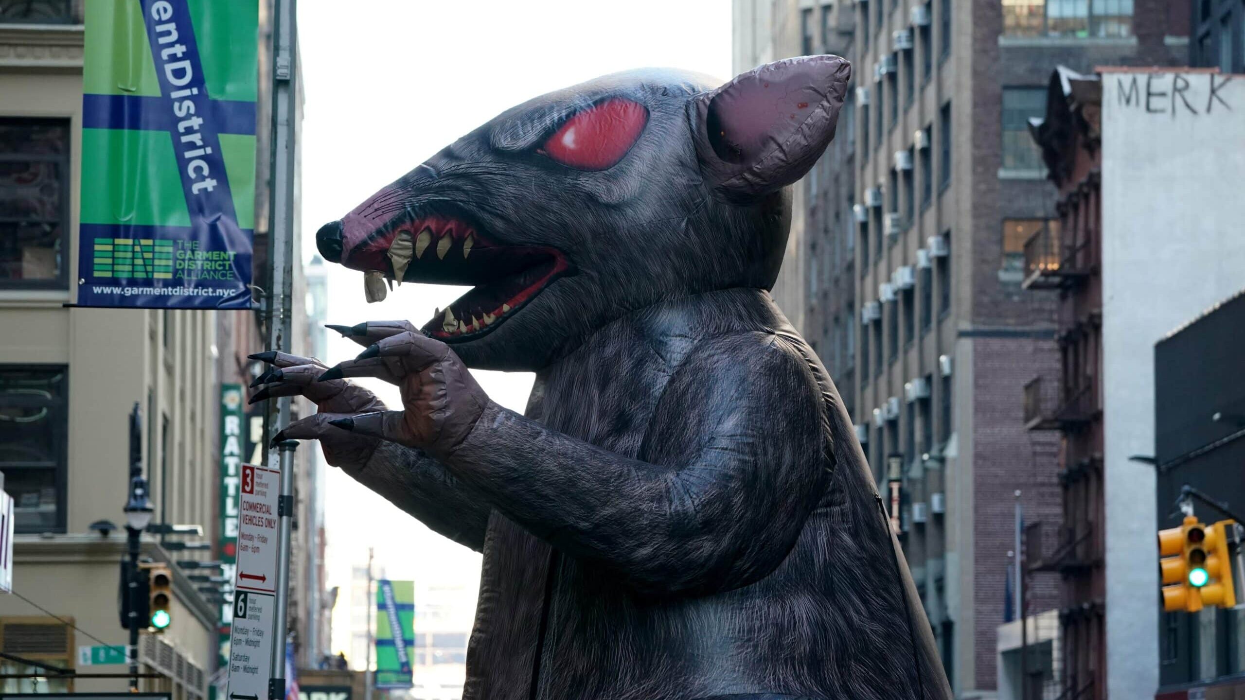 A giant inflatable rat makes its way down the street in midtown New York City November 26, 2019 where it will sit outside a company's office in New York.
