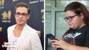 Man in white blazer and glasses posing at event, woman with glasses looking at phone indoors