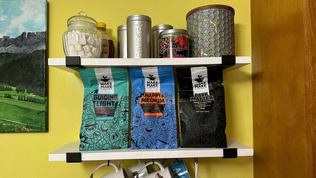A reviewer of Wake & Make shares his new collection of coffee on a kitchen shelf.