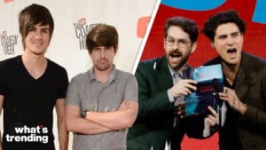 YouTube Comedy Week hosts and Streamy Awards presenters holding an award on stage
