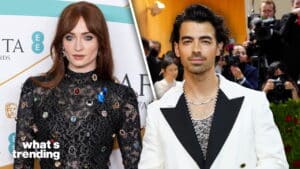 Sophie Turner in a black jeweled dress and Joe Jonas in a white tuxedo at a red carpet event.
