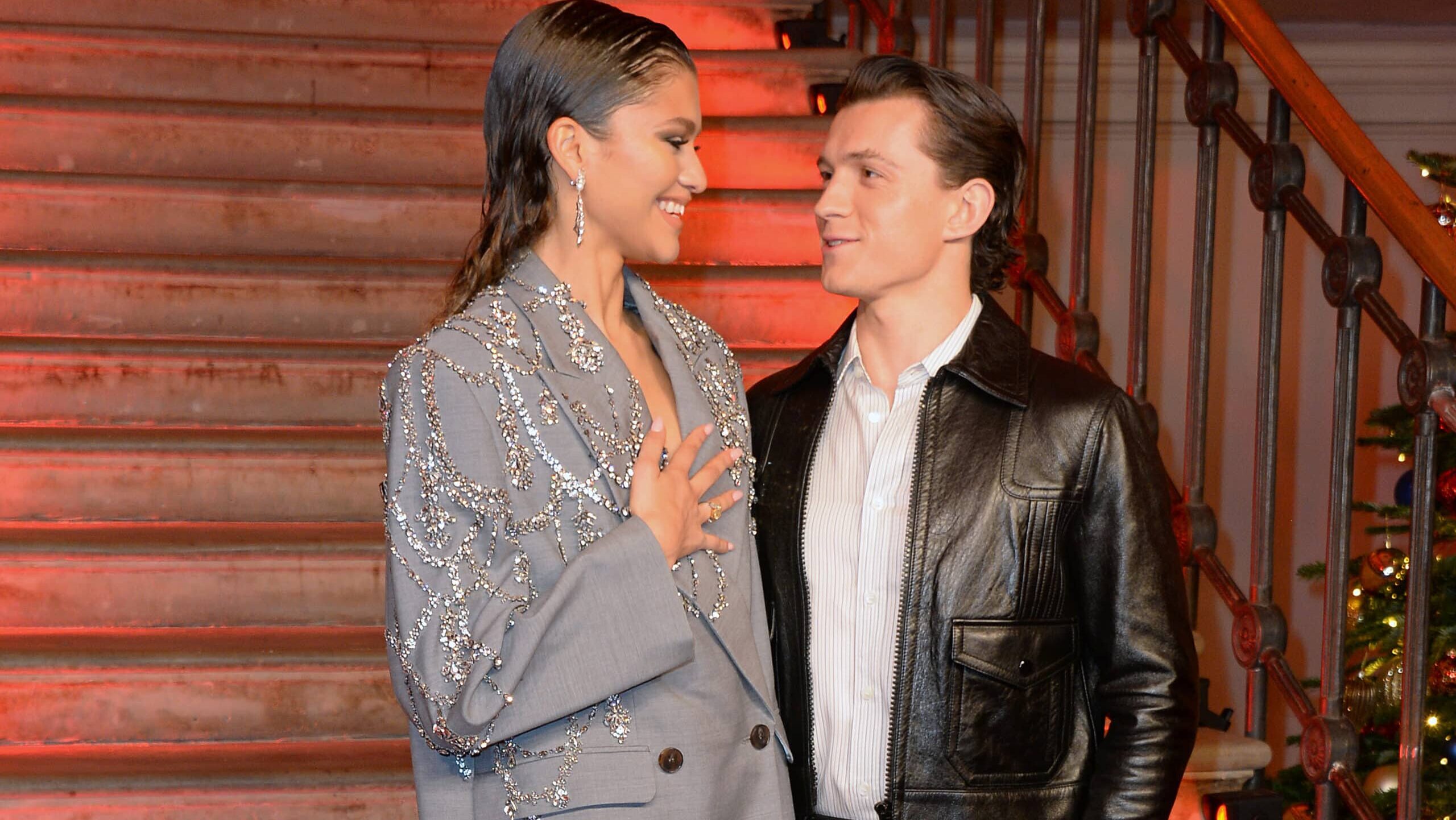 LONDON, ENGLAND - DECEMBER 05: Zendaya and Tom Holland pose at a photocall for "Spider-Man: No Way Home" at The Old Sessions House on December 5, 2021 in London, England.