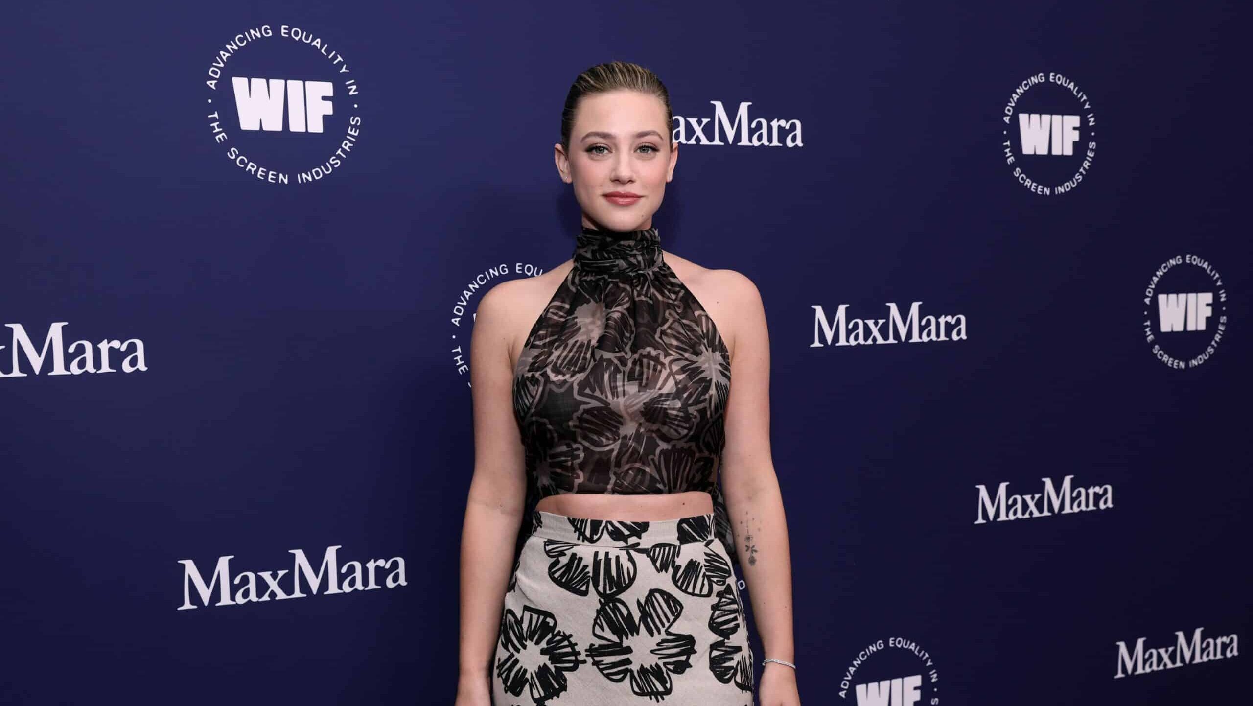 BEVERLY HILLS, CALIFORNIA - OCTOBER 27: Lili Reinhart, wearing Max Mara, attends the WIF Honors: Forging Forward Gala sponsored by Max Mara, ShivHans Pictures, Lexus and STARZ at The Beverly Hilton on October 27, 2022 in Beverly Hills, California. (Photo by Emma McIntyre/Getty Images for WIF