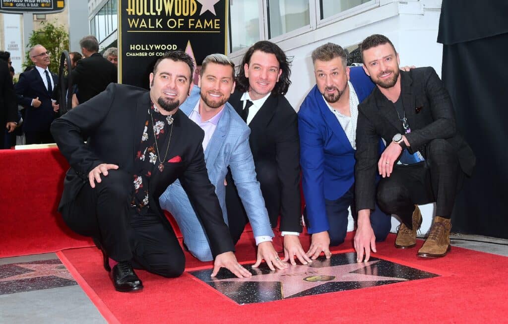 (L-R)Members of the iconic 90's boyband *NSYNC pose on their Hollywood Walk of Fame Star in Hollywood, California on April 30, 2018 where Chris Kirkpatrick,Lance Bass,JC Chasez,Joey Fatone and Justin Timberlake, received the 2,636th Star in the category of Recording. 