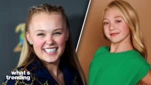 JoJo Siwa smiling with braided hair and a girl in a green top posing against a brown background