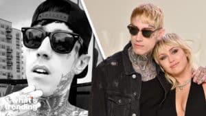 Machine Gun Kelly and Miley Cyrus posing together, both wearing sunglasses, with tattoos visible on Machine Gun Kelly.