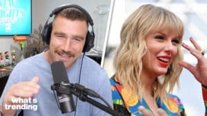 Podcast host with headphones speaking into a microphone next to a smiling Taylor Swift in a colorful outfit