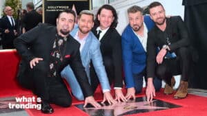 Backstreet Boys posing with their Hollywood Walk of Fame star during the ceremony