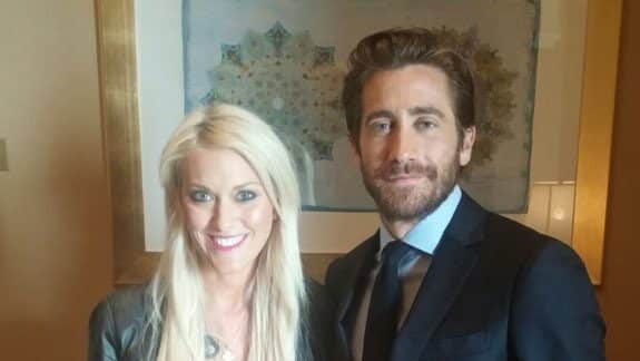 Alexandra Hirschi poses for a photo with Jake Gyllenhaal for an interview on Dubai Eye 108.3 in December of 2015.