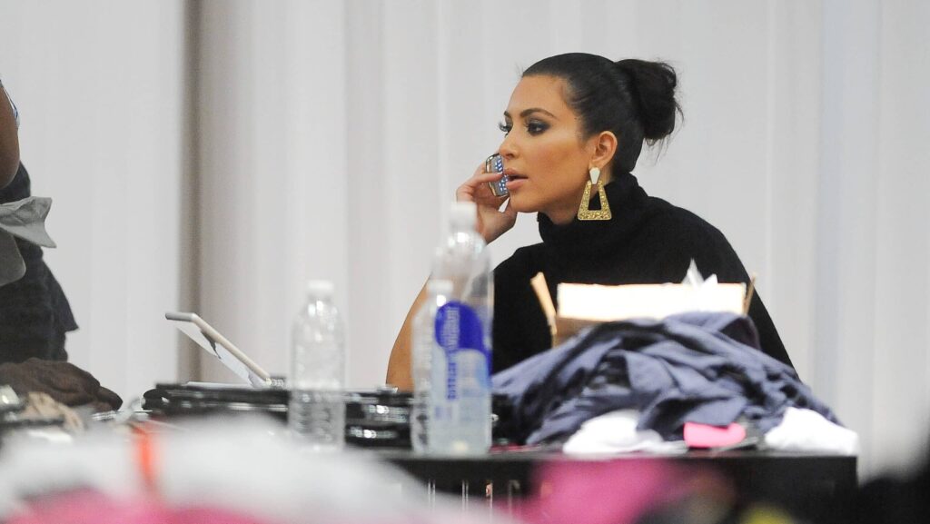 Television personality Kim Kardashian prepares for the store opening at Dash Store Soho on November 2, 2010 in New York City. 